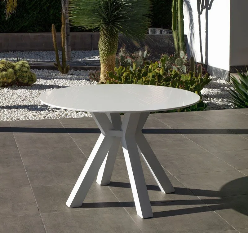 Mesa de comedor redonda en aluminio y tablero de Krion modelo Sumatra